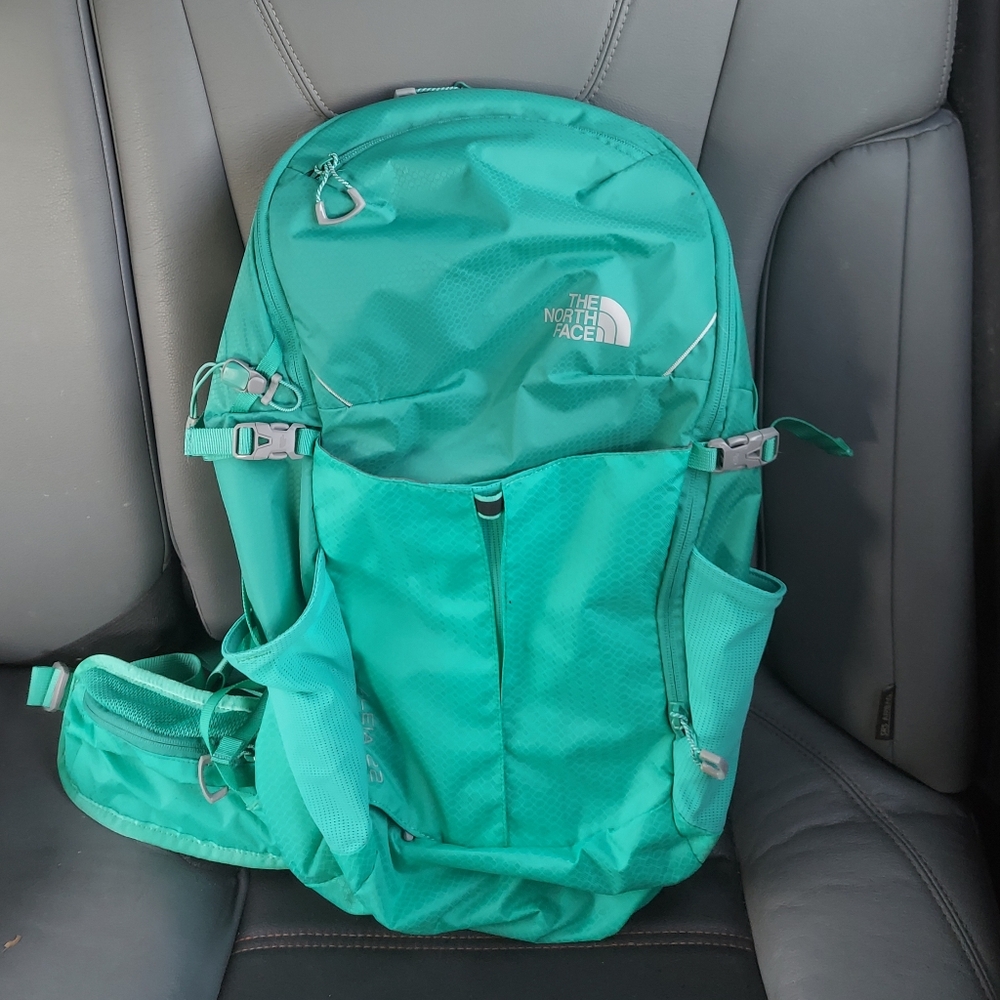 The North Face Teal Outdoor Daypack with Multiple Pockets